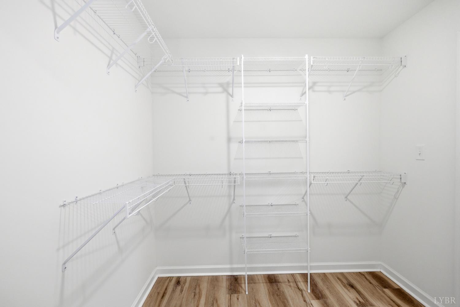 2541 Mitchell Mill Road Gladys, VA 24554 - Photo 14 of 41 a view of a room with racks on the wall