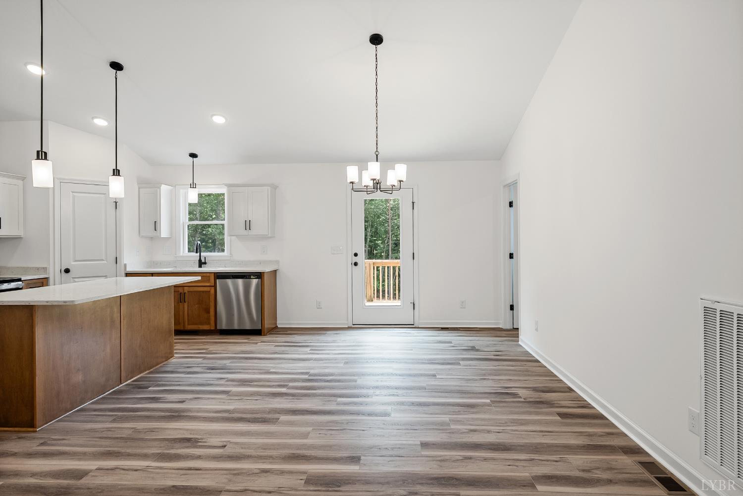 2541 Mitchell Mill Road Gladys, VA 24554 - Photo 16 of 44 a view of a kitchen with a chandelier