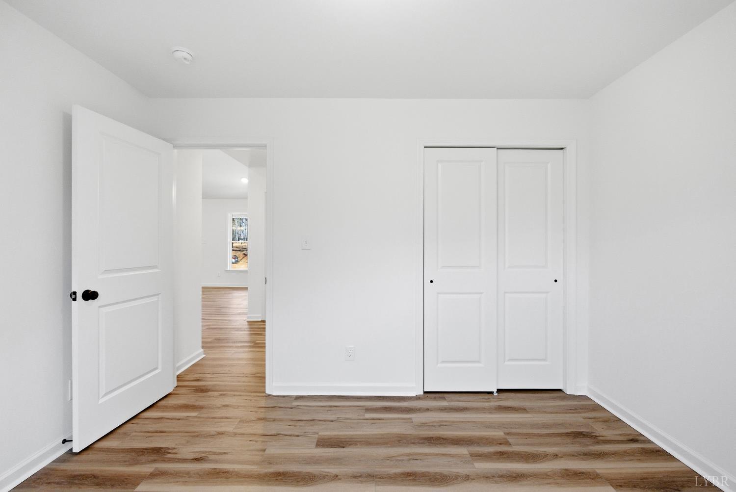 2541 Mitchell Mill Road Gladys, VA 24554 - Photo 16 of 41 a view of a hallway with wooden floor