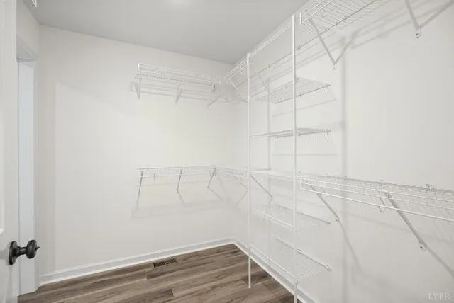 a view of a room with racks on the wall