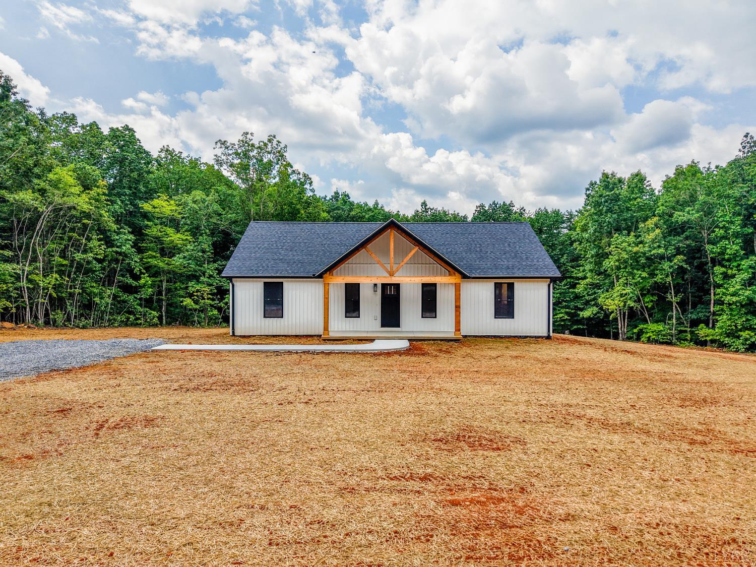 2541 Mitchell Mill Road Gladys, VA 24554 - Photo 29 of 44 a house with trees in the background