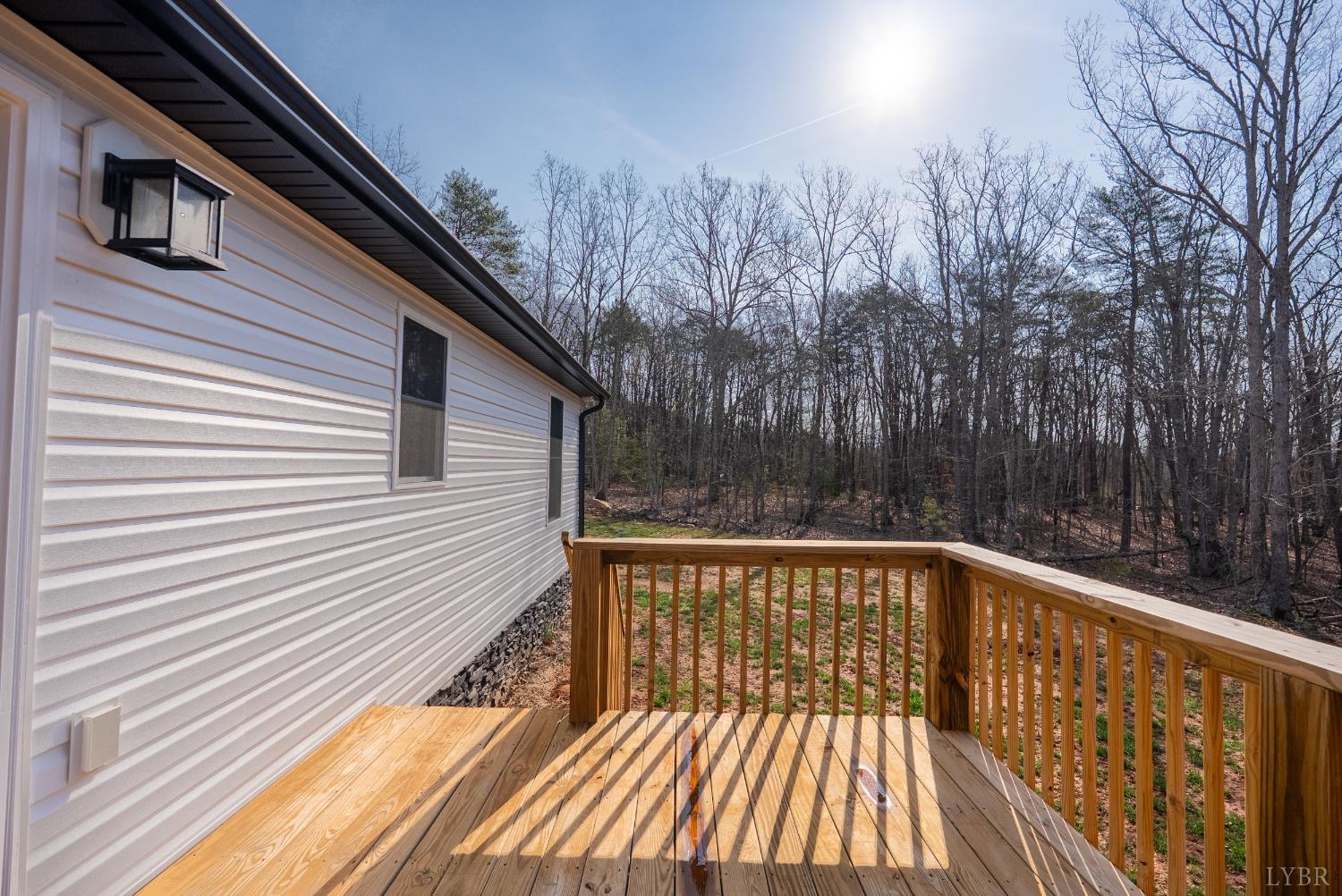 2541 Mitchell Mill Road Gladys, VA 24554 - Photo 30 of 41 a view of balcony with wooden floor and fence
