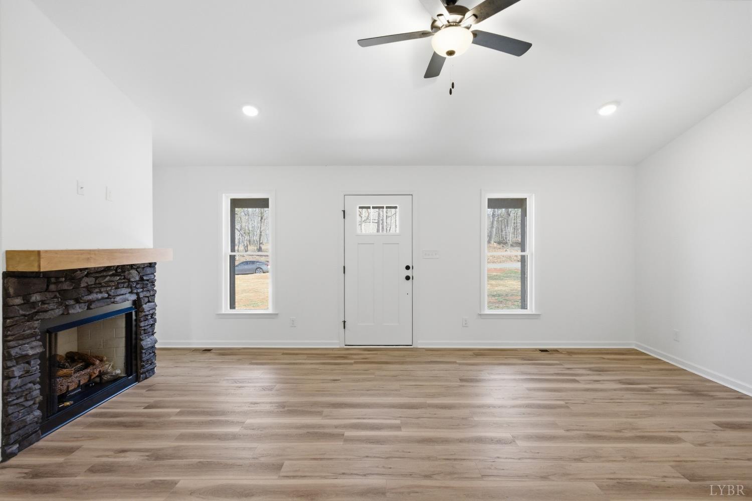 2541 Mitchell Mill Road Gladys, VA 24554 - Photo 3 of 41 a view of an empty room with window and wooden floor