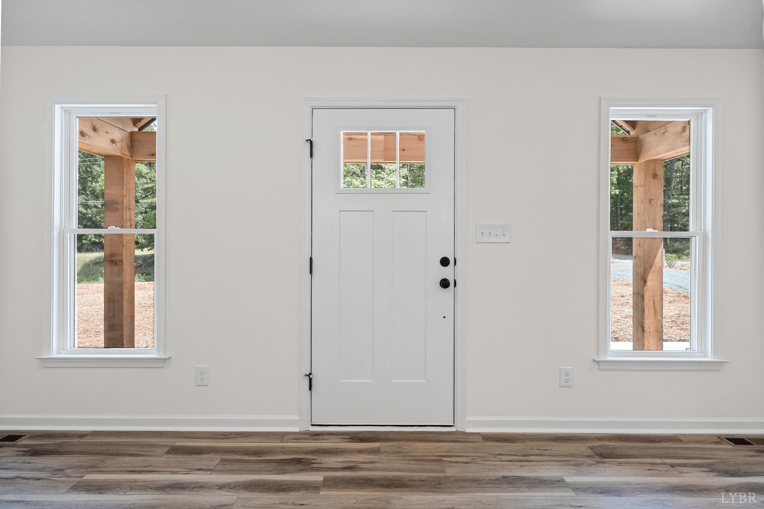 2541 Mitchell Mill Road Gladys, VA 24554 - Photo 3 of 44 a view of a bedroom with wooden floor and window