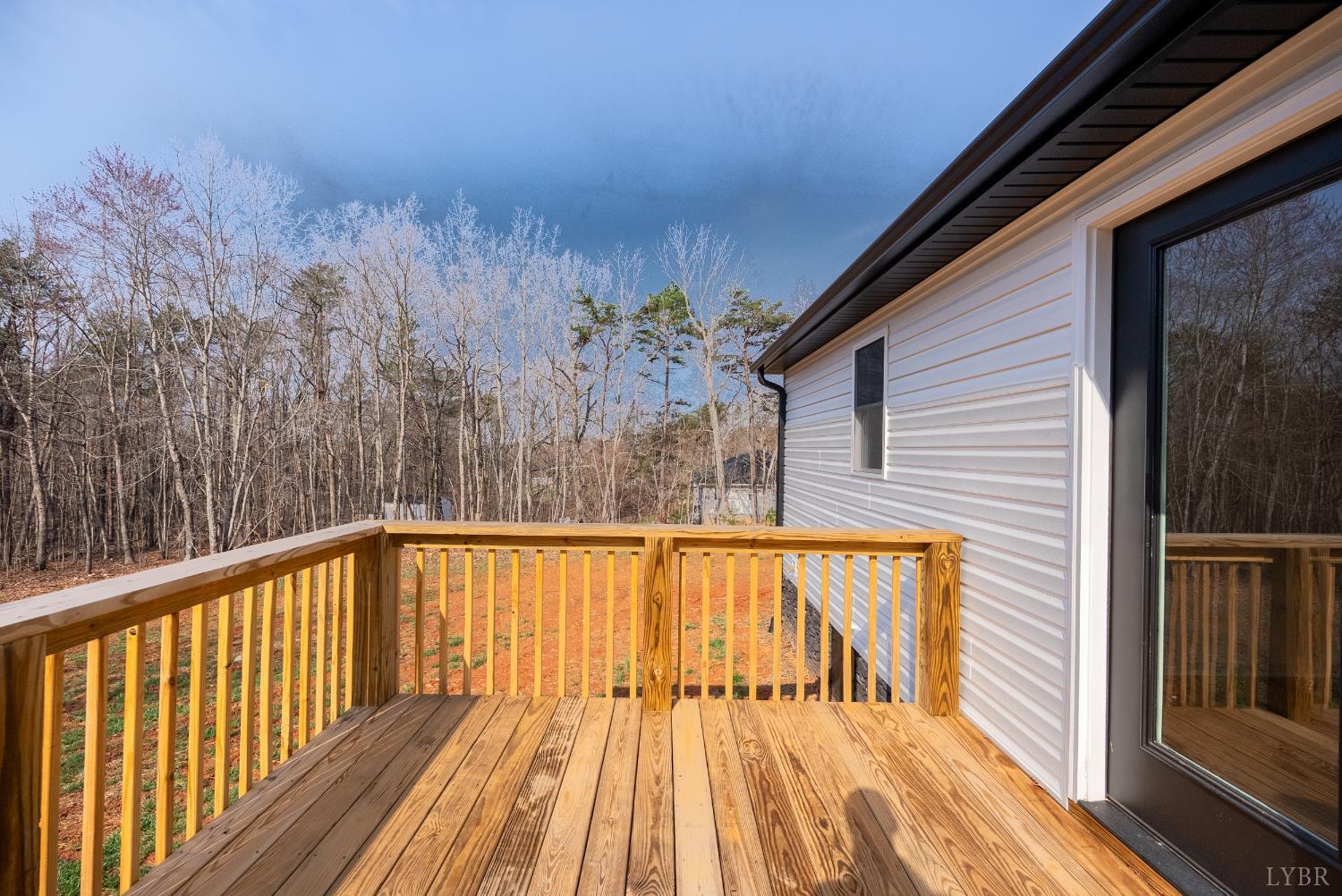 2541 Mitchell Mill Road Gladys, VA 24554 - Photo 31 of 41 a view of a balcony with wooden floor and fence
