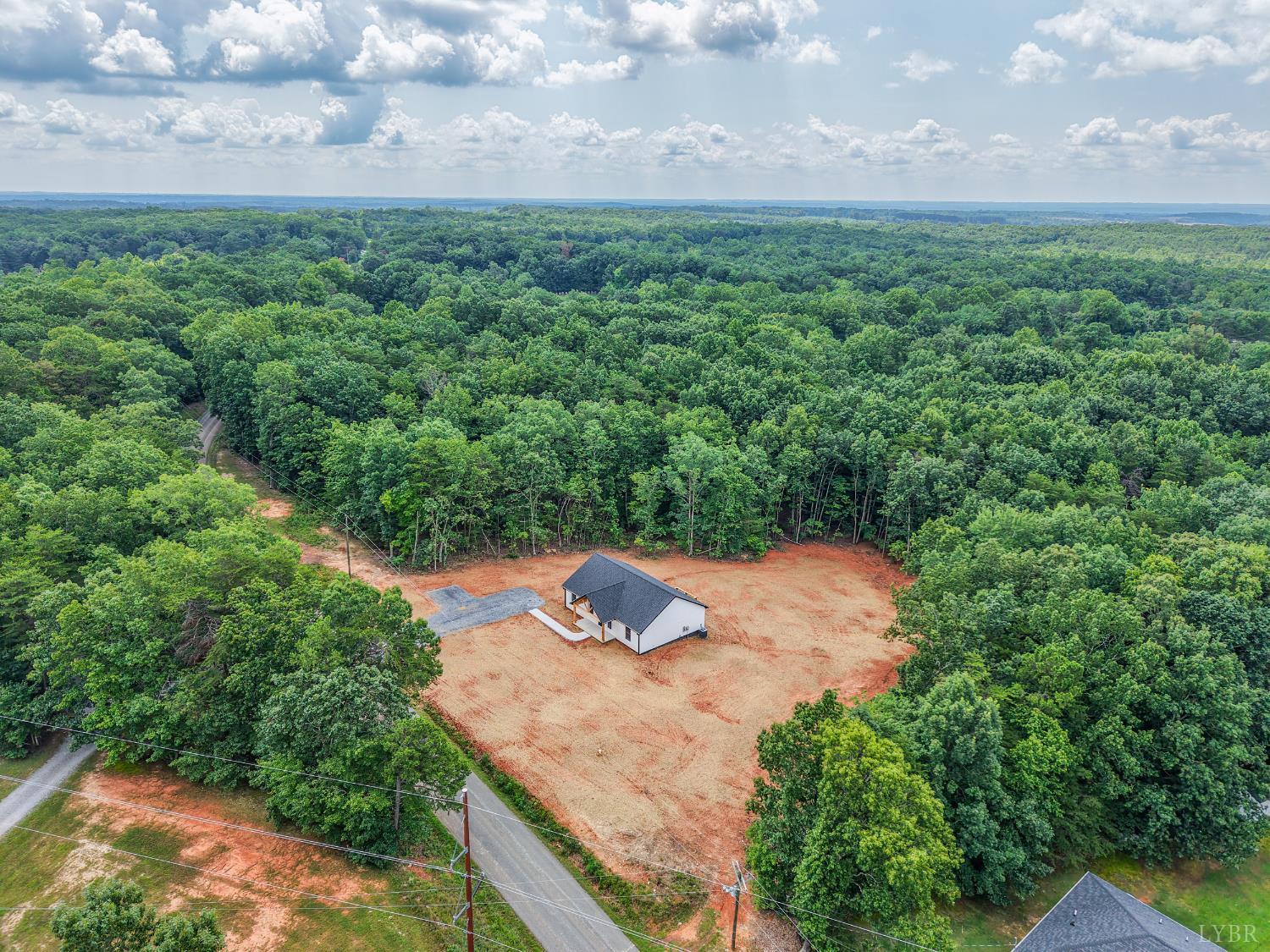 2541 Mitchell Mill Road Gladys, VA 24554 - Photo 40 of 44 an aerial view of a house with yard and outdoor seating