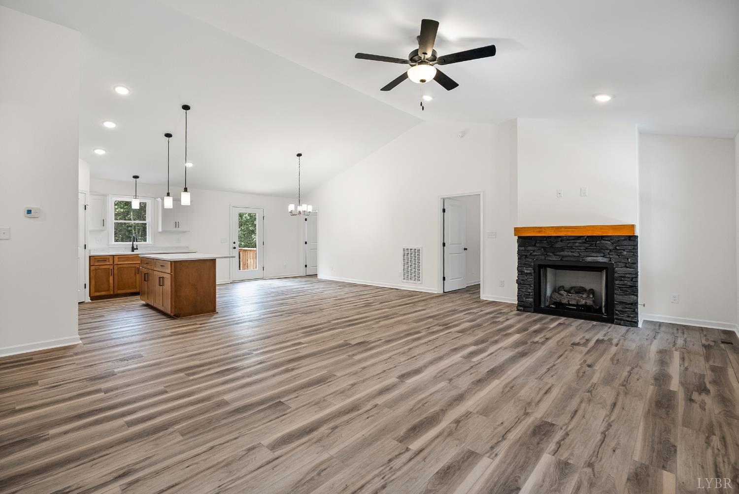 2541 Mitchell Mill Road Gladys, VA 24554 - Photo 4 of 44 a view of a kitchen with furniture and a fireplace