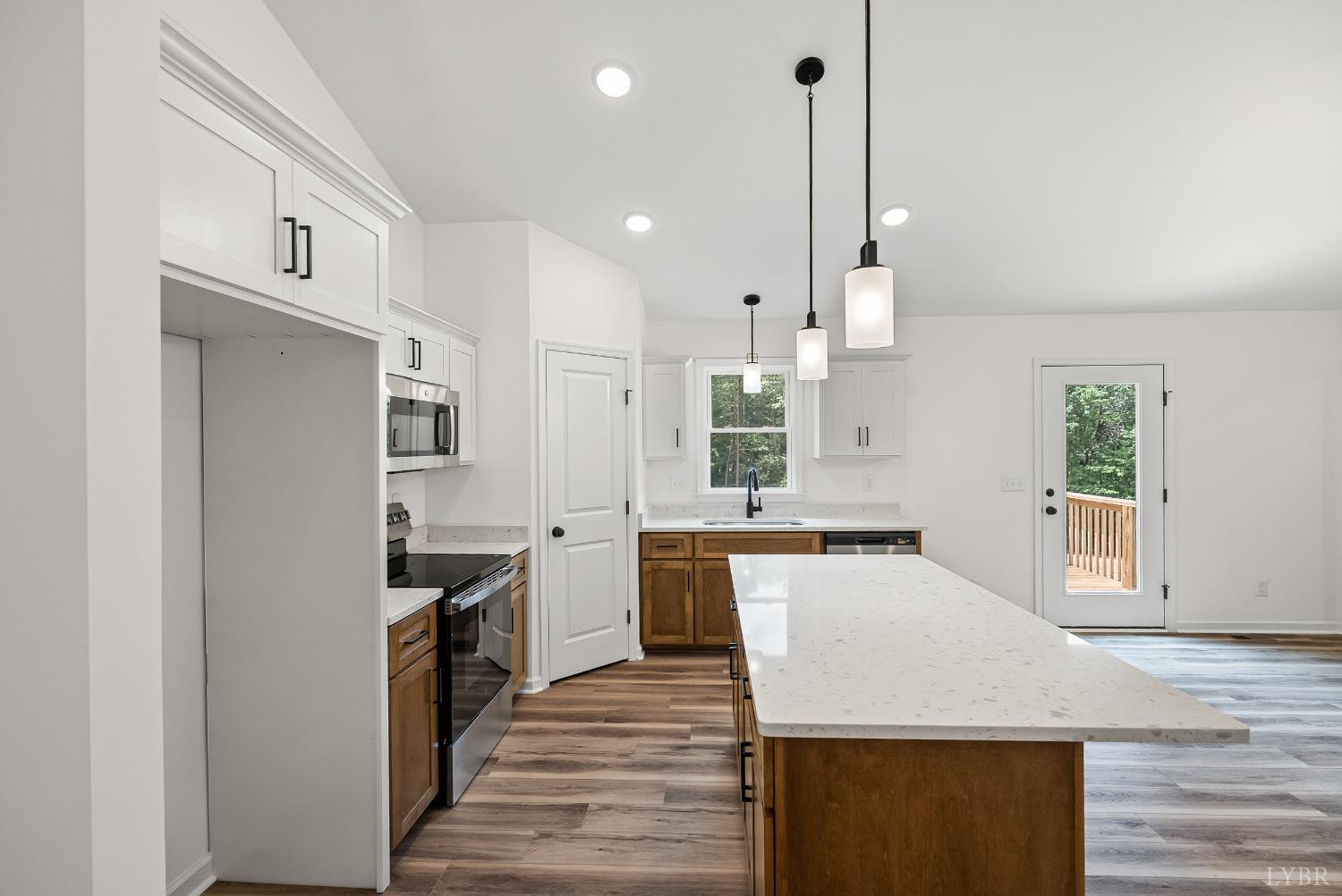 2541 Mitchell Mill Road Gladys, VA 24554 - Photo 10 of 44 a kitchen with stainless steel appliances granite countertop a sink stove and refrigerator
