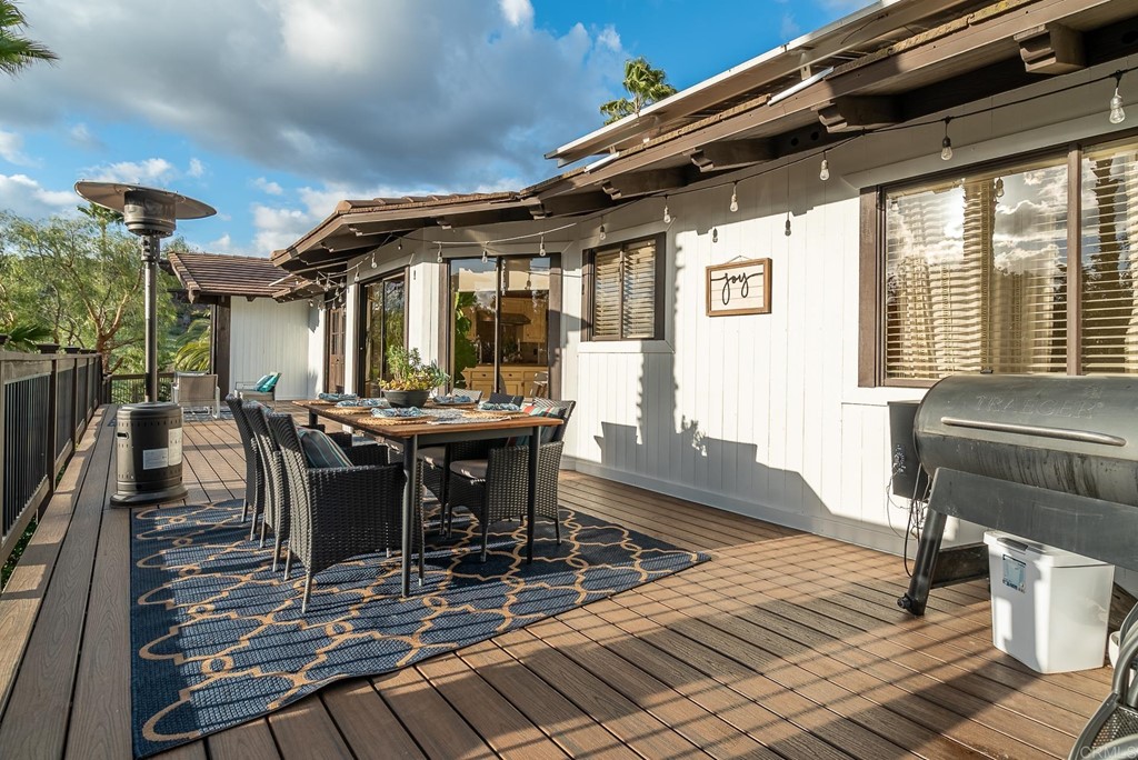 3342 White Hawk Road Escondido, CA 92027 - Photo 40 of 63 a view of a patio with table and chairs