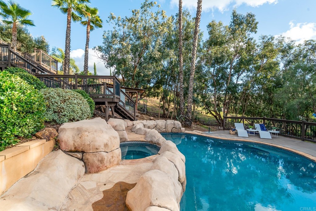 3342 White Hawk Road Escondido, CA 92027 - Photo 47 of 63 a view of yard with swimming pool and trees in the background