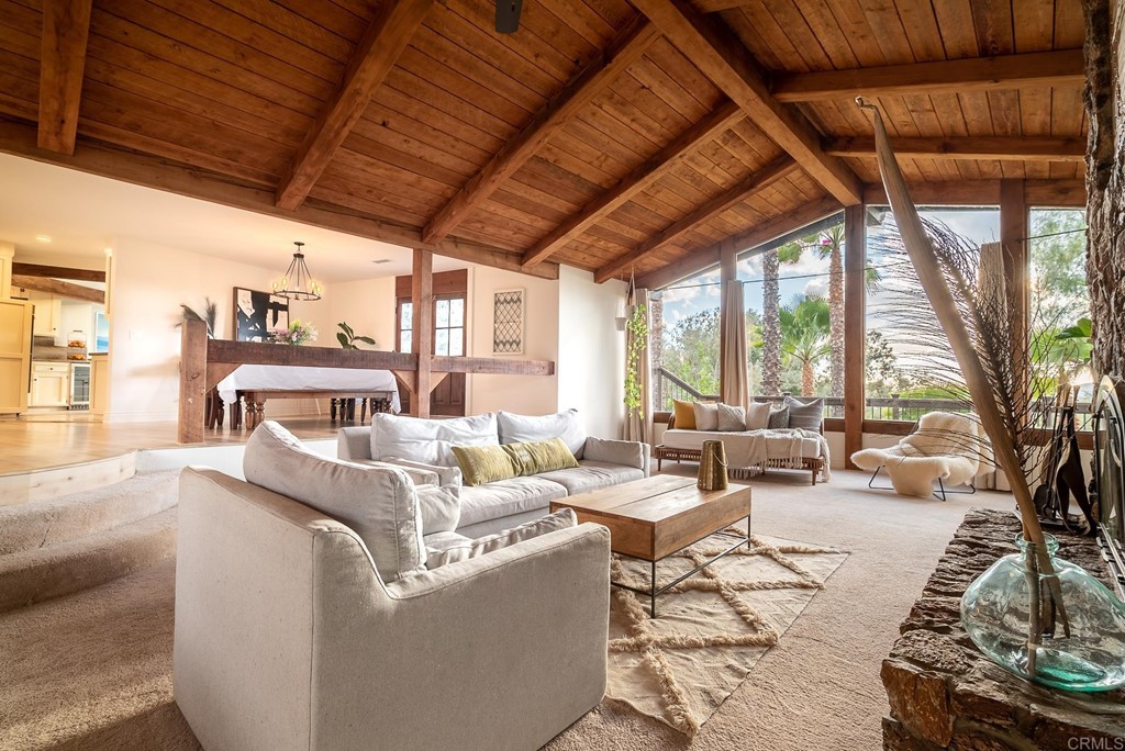 3342 White Hawk Road Escondido, CA 92027 - Photo 10 of 63 a living room with furniture and a large window