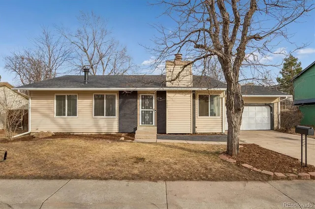 a house with trees in front of it