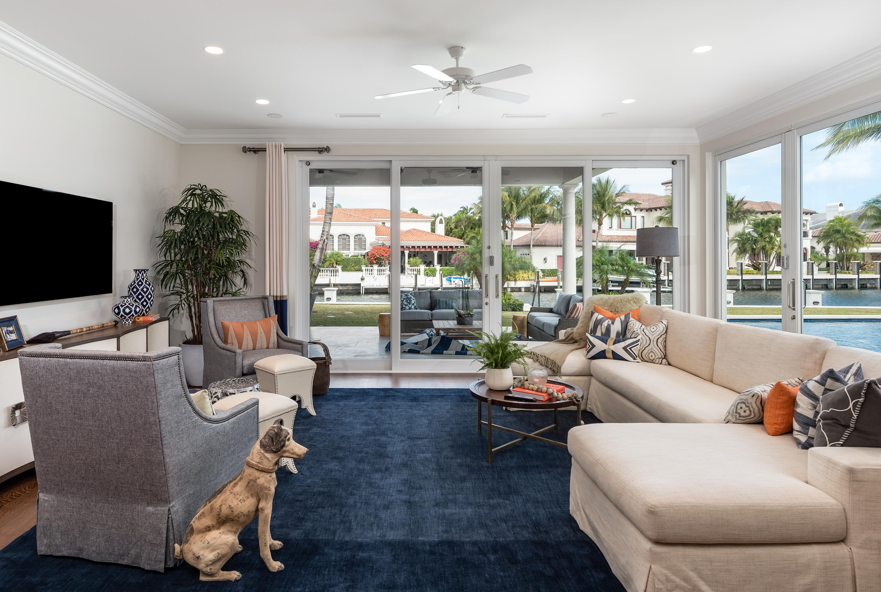651 Northeast 45th Road Boca Raton, FL 33431 - Photo 7 of 23 a living room with furniture and a flat screen tv