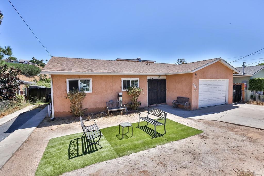 7047 Jamacha Road San Diego, CA 92114 - Photo 1 of 1 a front view of house with yard outdoor seating and green space