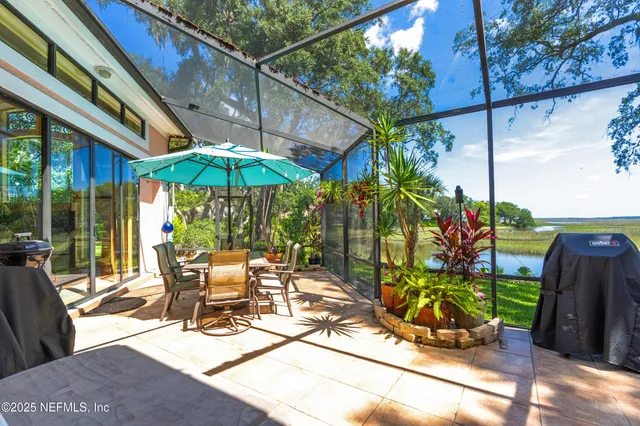 a kitchen with stainless steel appliances granite countertop a refrigerator a stove top oven a sink and dishwasher