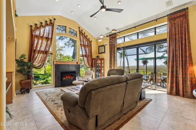 a bathroom with a granite countertop sink mirror and shower