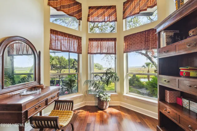 a view of a lake with a yard