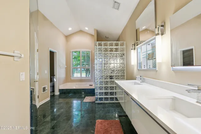 a view of a lake with a building in the background