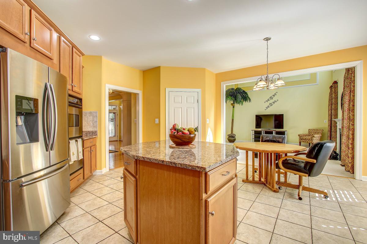 6 Glen Eagles Court Silver Spring, MD 20906 - Photo 15 of 47 Gourmet Kitchen opens to Large Family Room