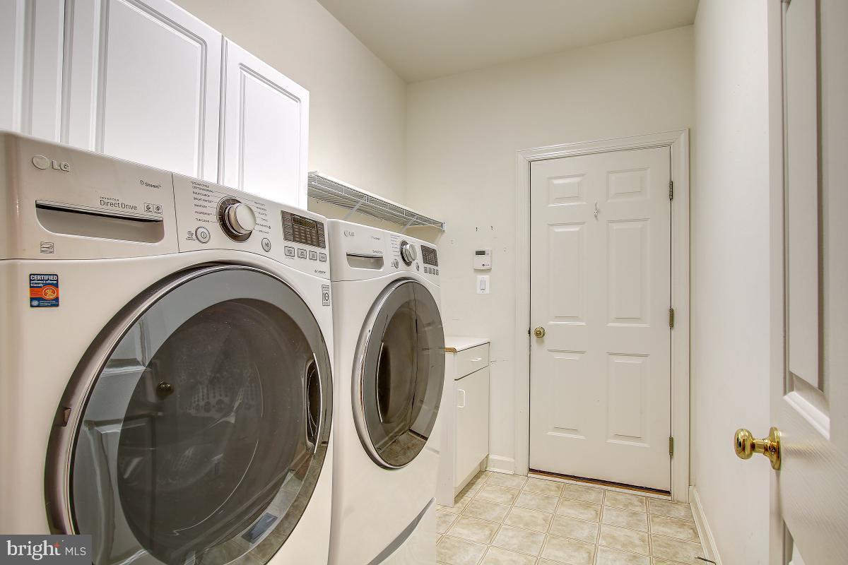 6 Glen Eagles Court Silver Spring, MD 20906 - Photo 17 of 47 Laundry Room with Storage and Shelving