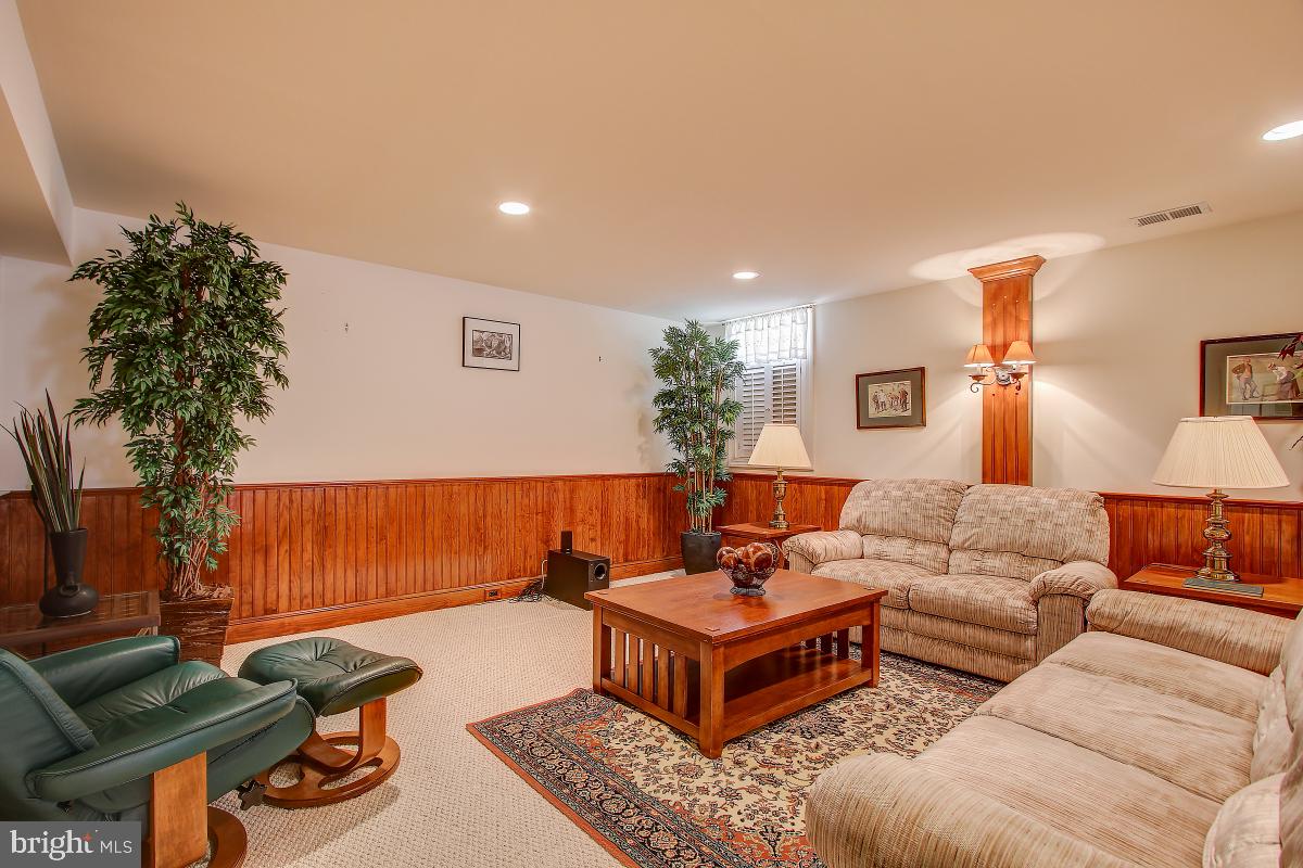 6 Glen Eagles Court Silver Spring, MD 20906 - Photo 34 of 47 Inviting Lower Level with recessed lighting