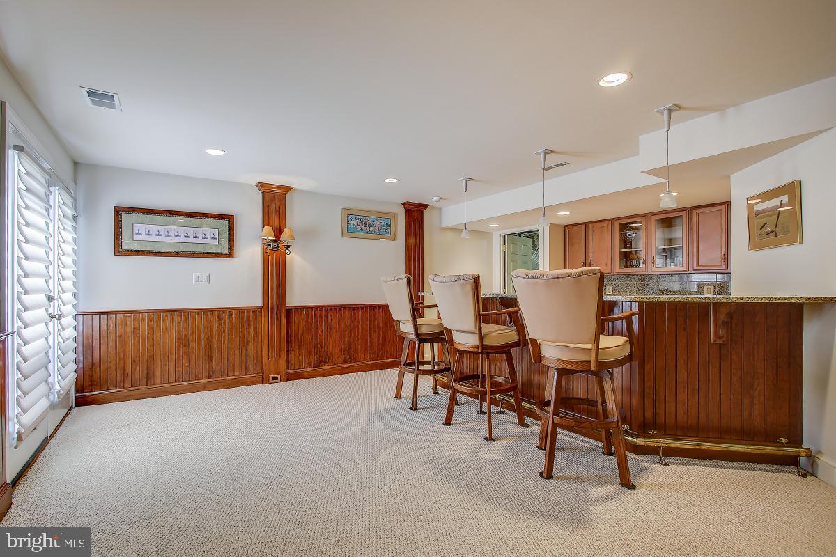 6 Glen Eagles Court Silver Spring, MD 20906 - Photo 39 of 47 Lower Level with Bar Area and Walkup