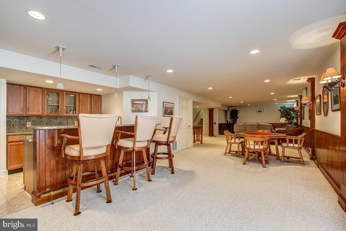 6 Glen Eagles Court Silver Spring, MD 20906 - Photo 41 of 47 Bar Area in lower lever with granite countertop