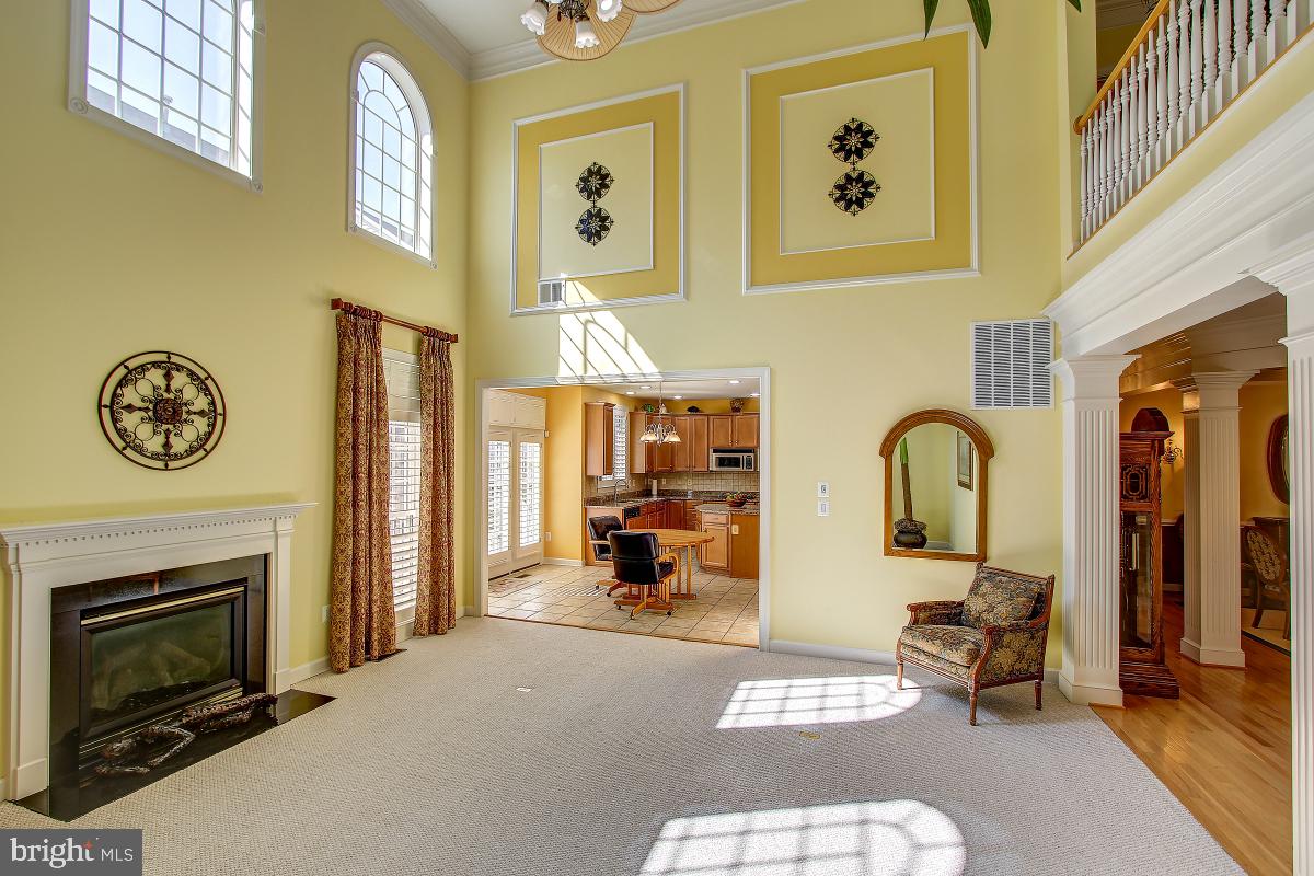 6 Glen Eagles Court Silver Spring, MD 20906 - Photo 10 of 47 Family Room with Gas Fireplace and Mantle