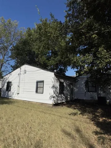 a view of a yard with an outdoor space