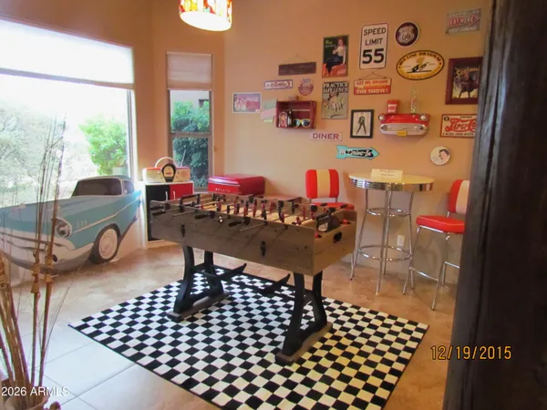 a living room with a couch and a table