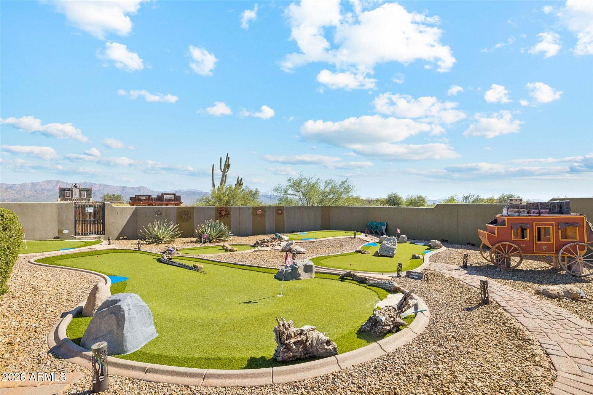 30012 North 170th Street Rio Verde, AZ 85263 - Photo 26 of 32 a view of a swimming pool with a lounge chair