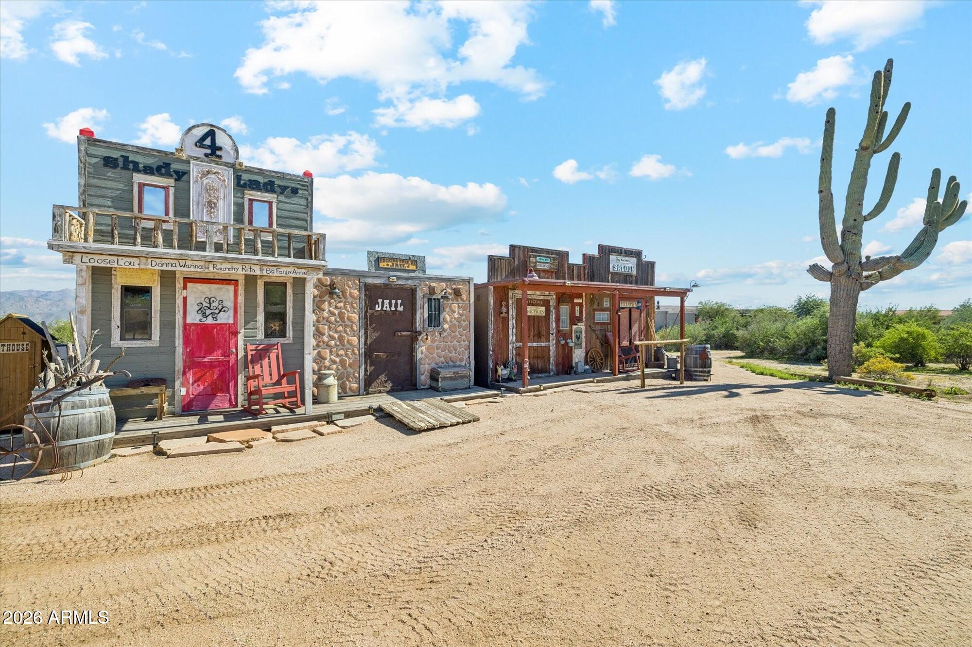 30012 North 170th Street Rio Verde, AZ 85263 - Photo 29 of 32 a view of a house with large windows and playing area