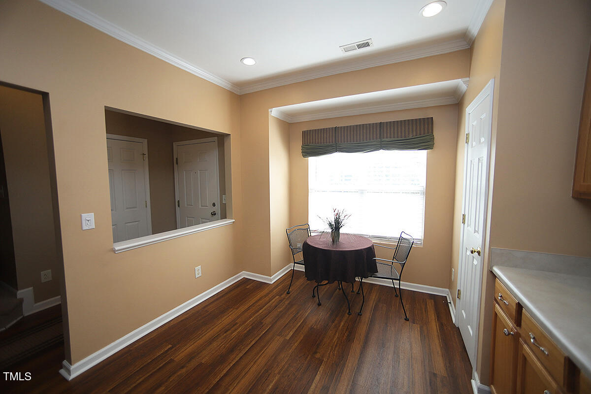 426 Alero Road Raleigh, NC 27610 - Photo 5 of 13 Eat in kitchen set it for two or four.