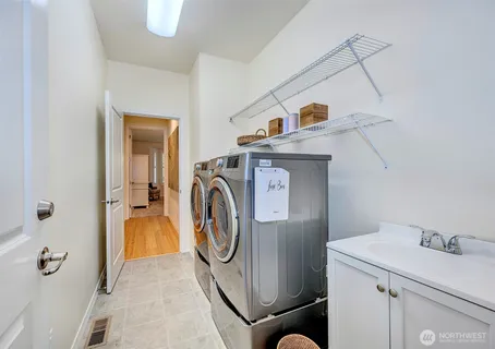 a utility room with dryer and washer