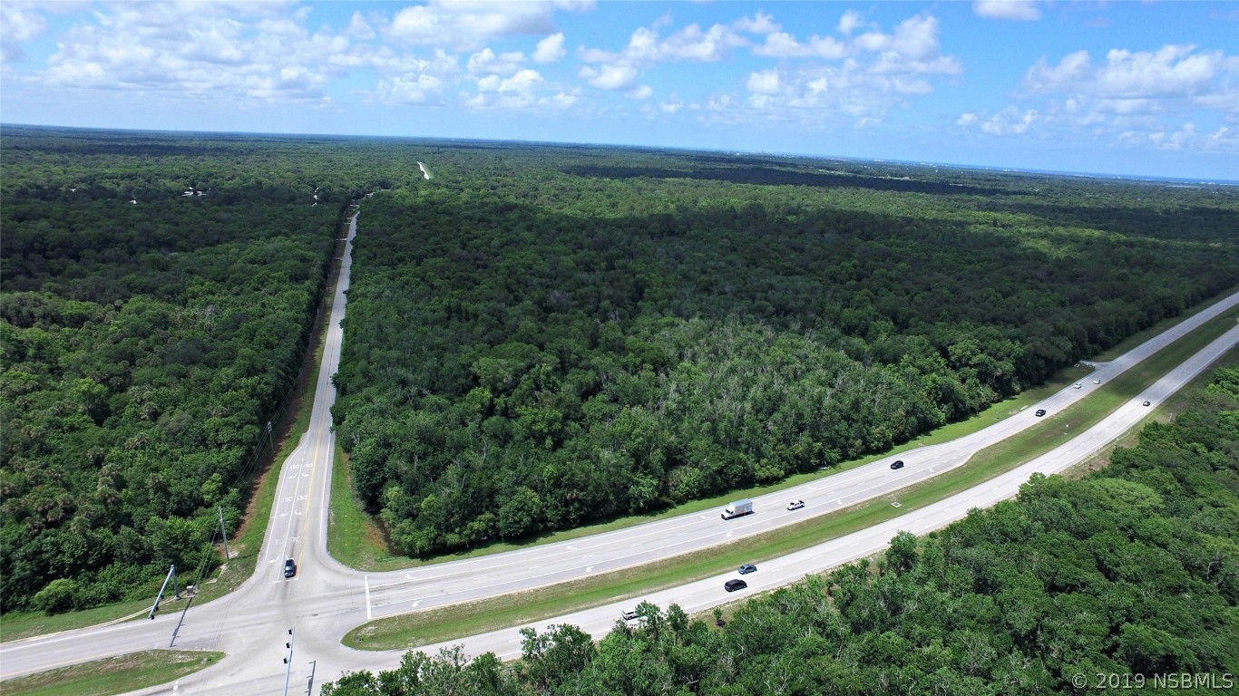 Xx West Indian River Boulevard Edgewater, FL 32141 - Photo 2 of 5 a view of a field with an outdoor space