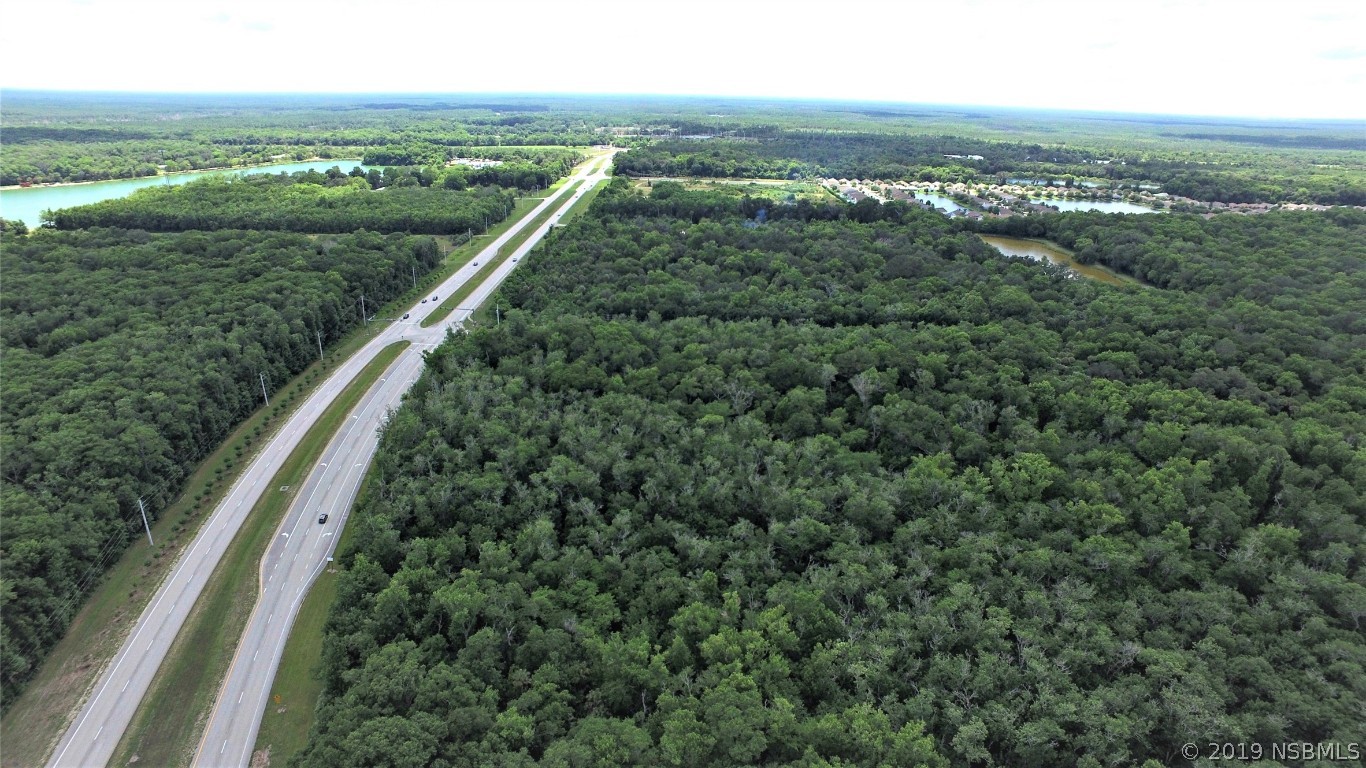 Xx West Indian River Boulevard Edgewater, FL 32141 - Photo 4 of 5 a view of a city from a balcony with outdoor space