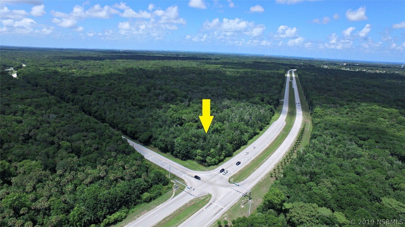 Xx West Indian River Boulevard Edgewater, FL 32141 - Photo 5 of 5 a view of a garden from a balcony