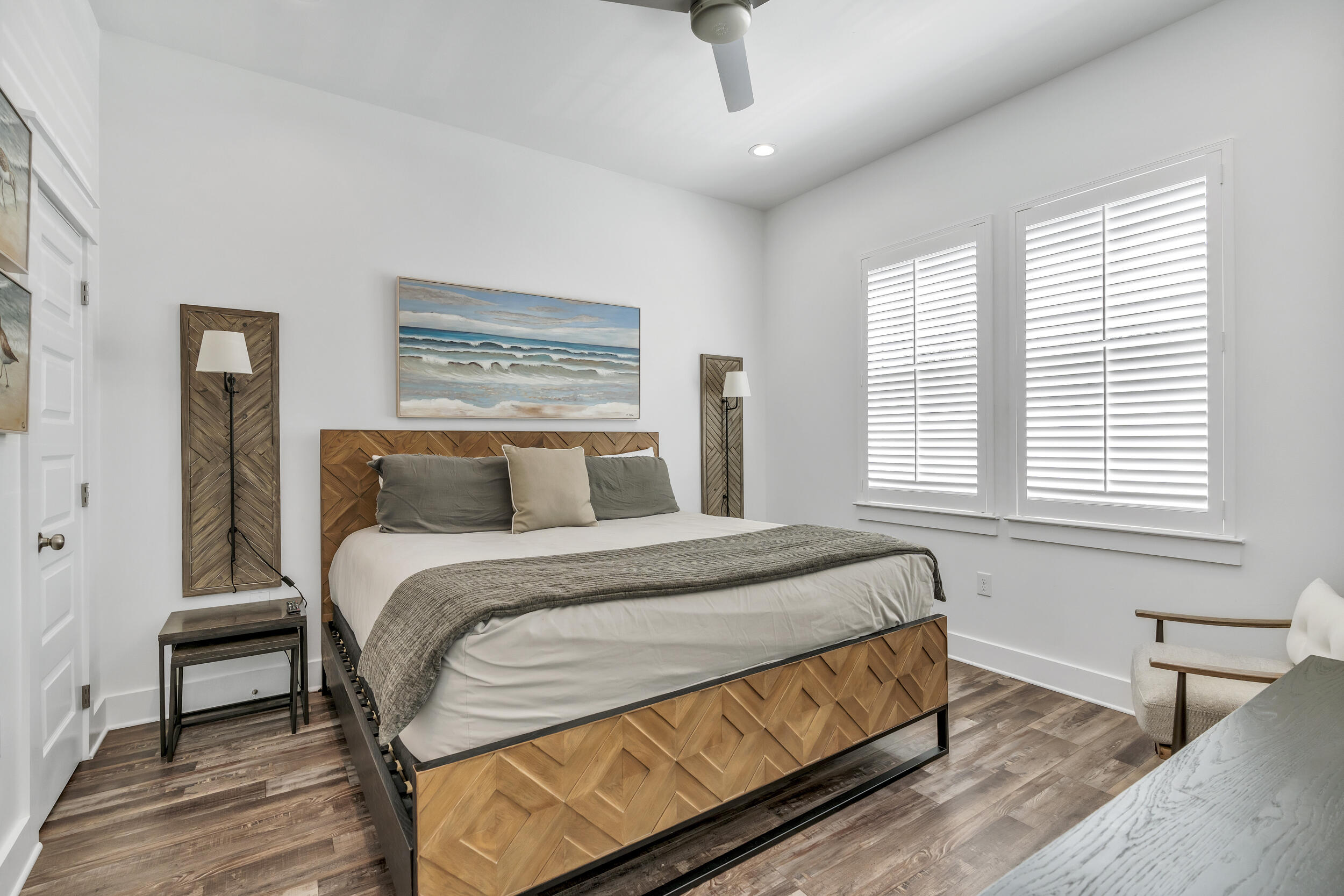 88 Pompano Street Destin, FL 32541 - Photo 11 of 109 a bed sitting in a bedroom next to a window