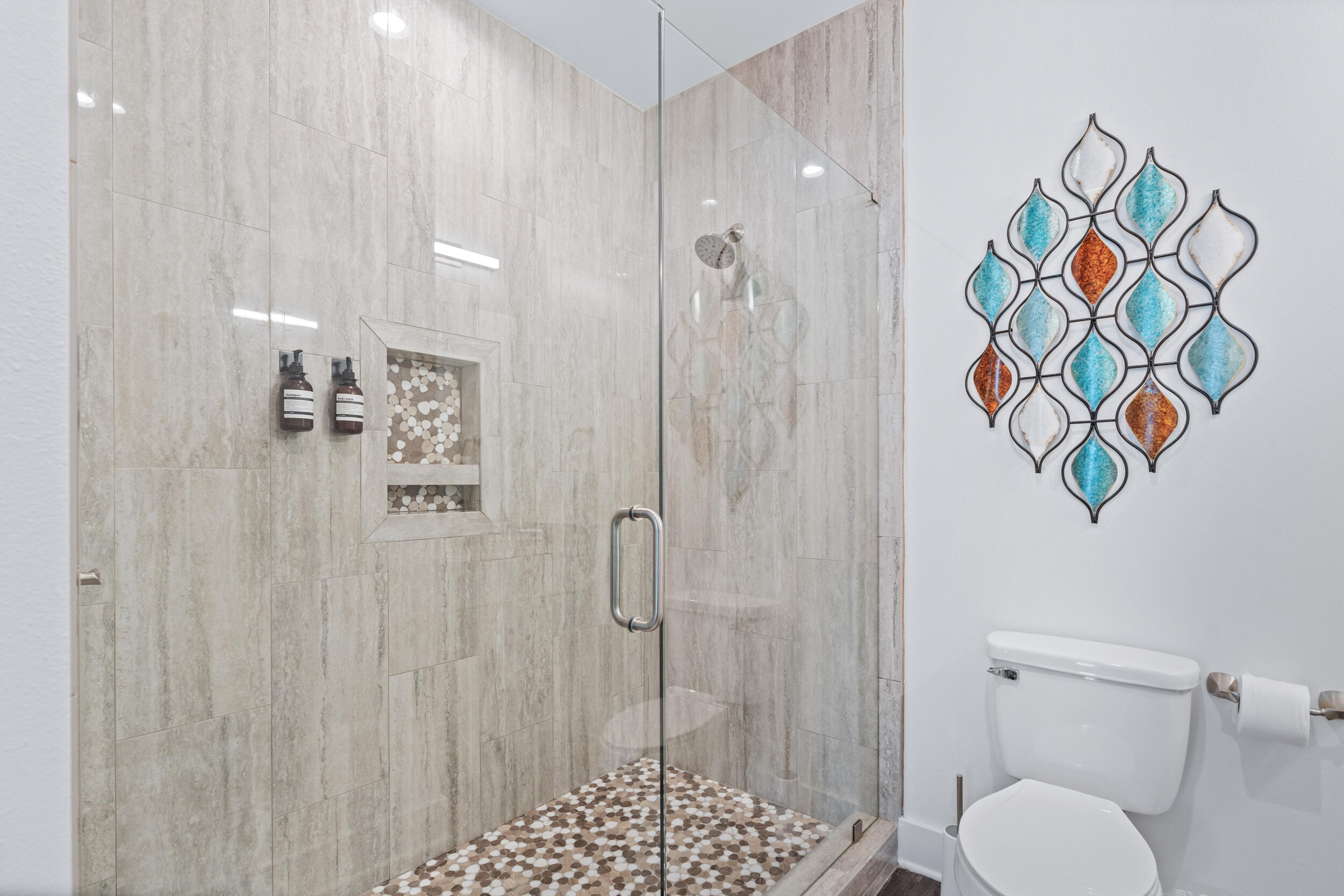 88 Pompano Street Destin, FL 32541 - Photo 61 of 109 a bathroom with a shower and a toilet