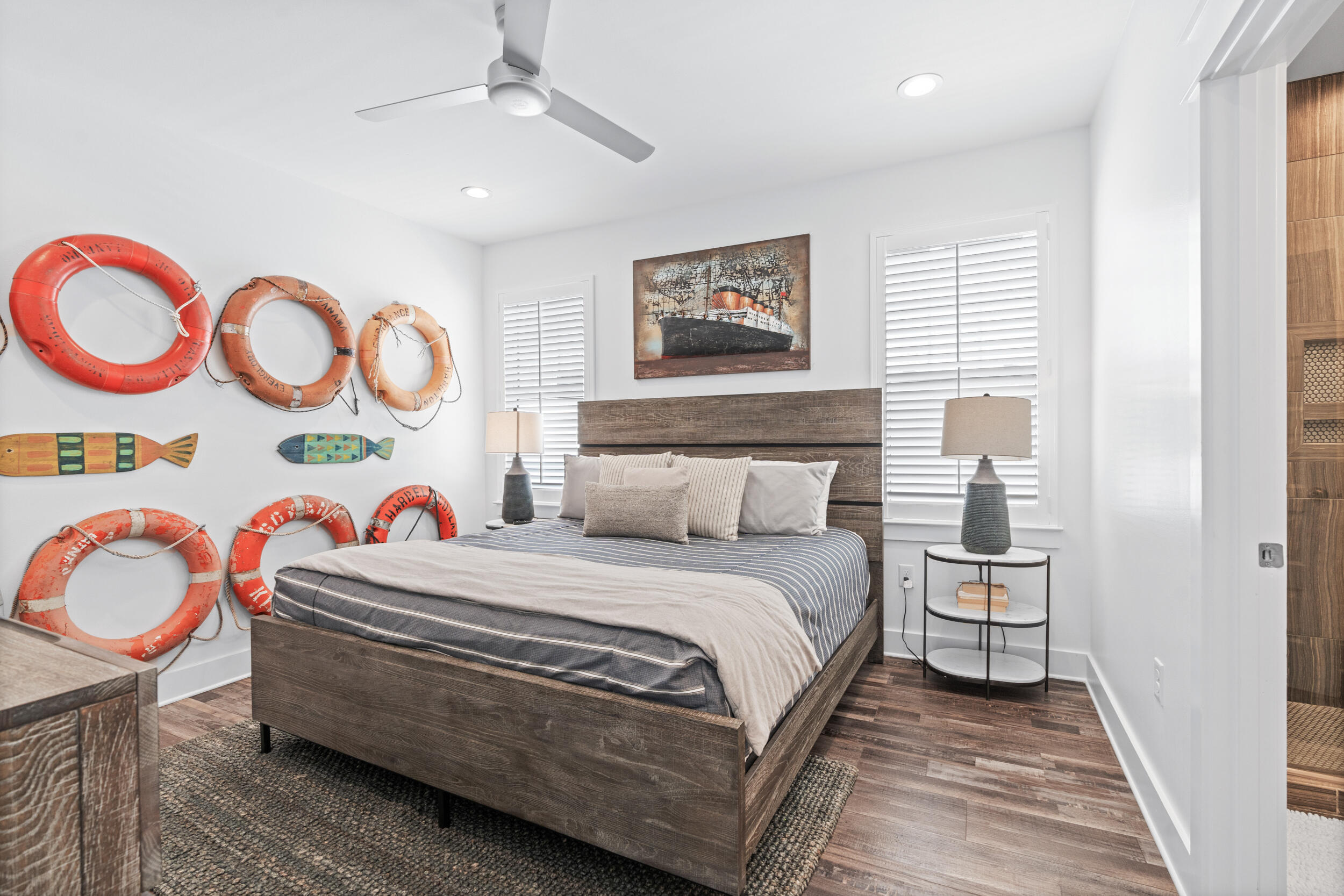 88 Pompano Street Destin, FL 32541 - Photo 63 of 109 a bedroom with a bed and painting on the wall