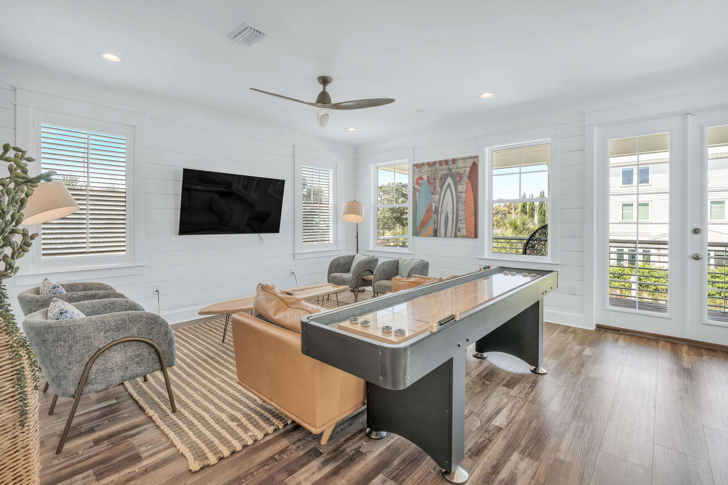 88 Pompano Street Destin, FL 32541 - Photo 67 of 109 a view of a livingroom with furniture window and wooden floor