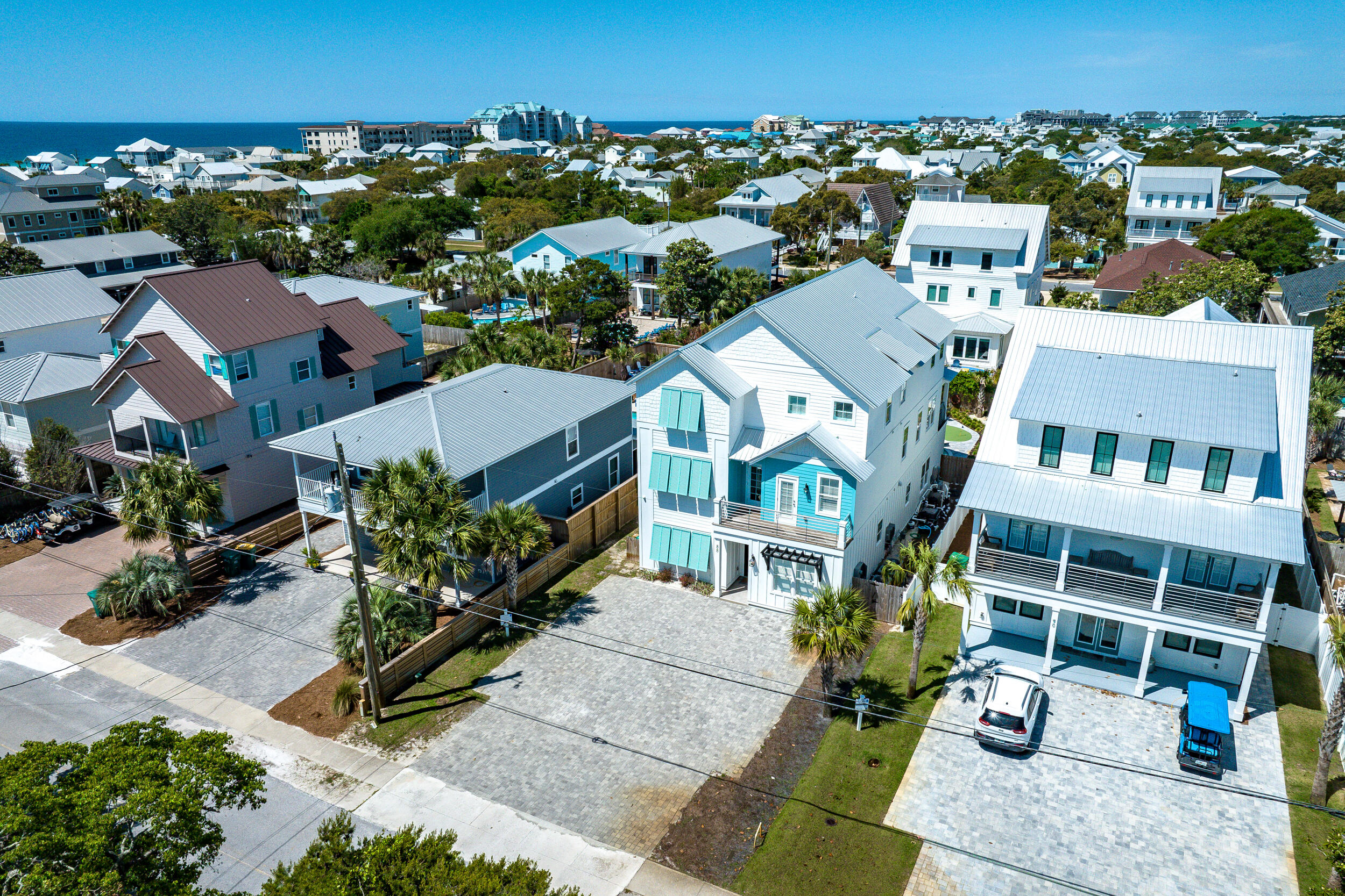 88 Pompano Street Destin, FL 32541 - Photo 8 of 109 an aerial view of multiple houses with a yard