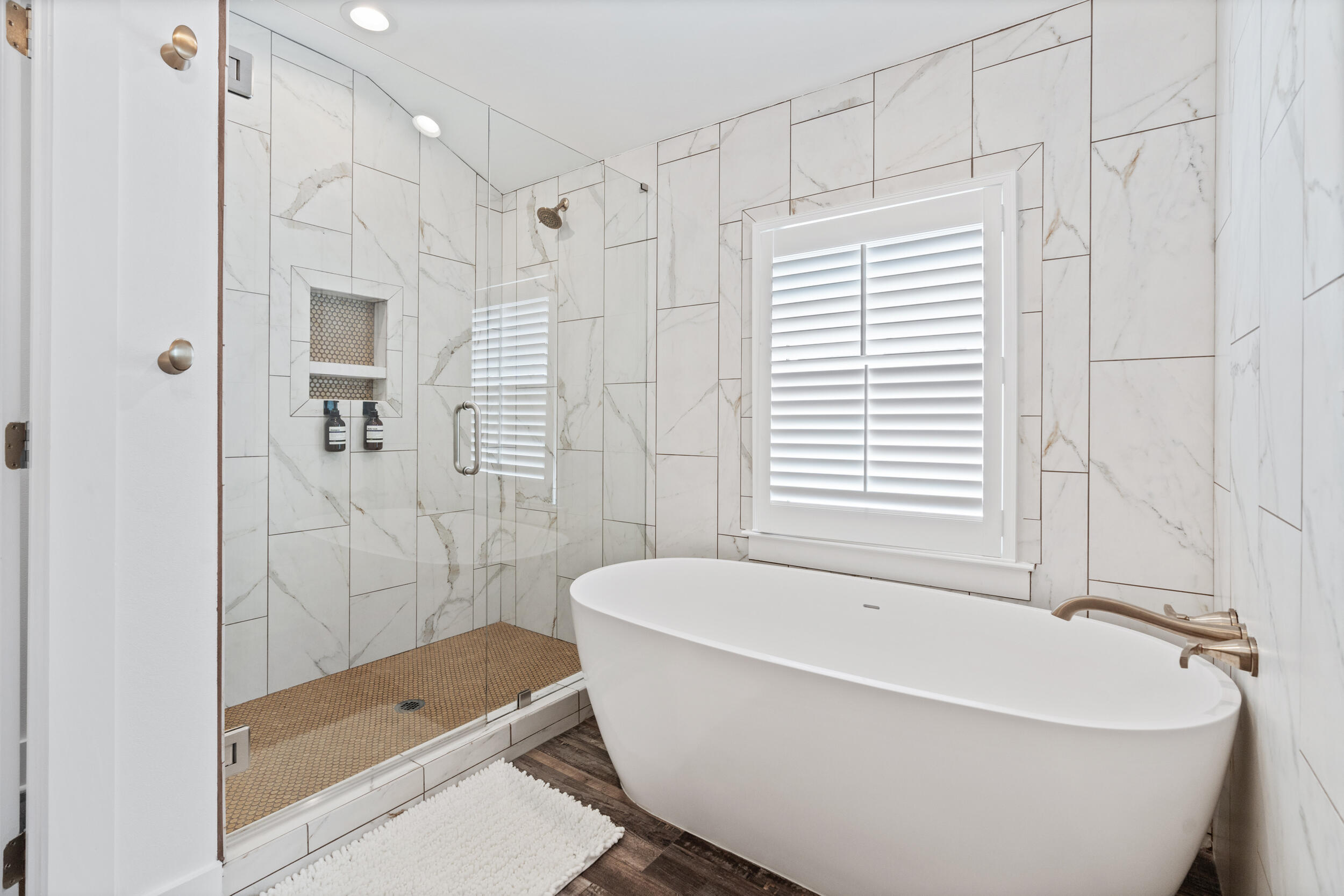 88 Pompano Street Destin, FL 32541 - Photo 81 of 109 a white bath tub sitting next to a shower