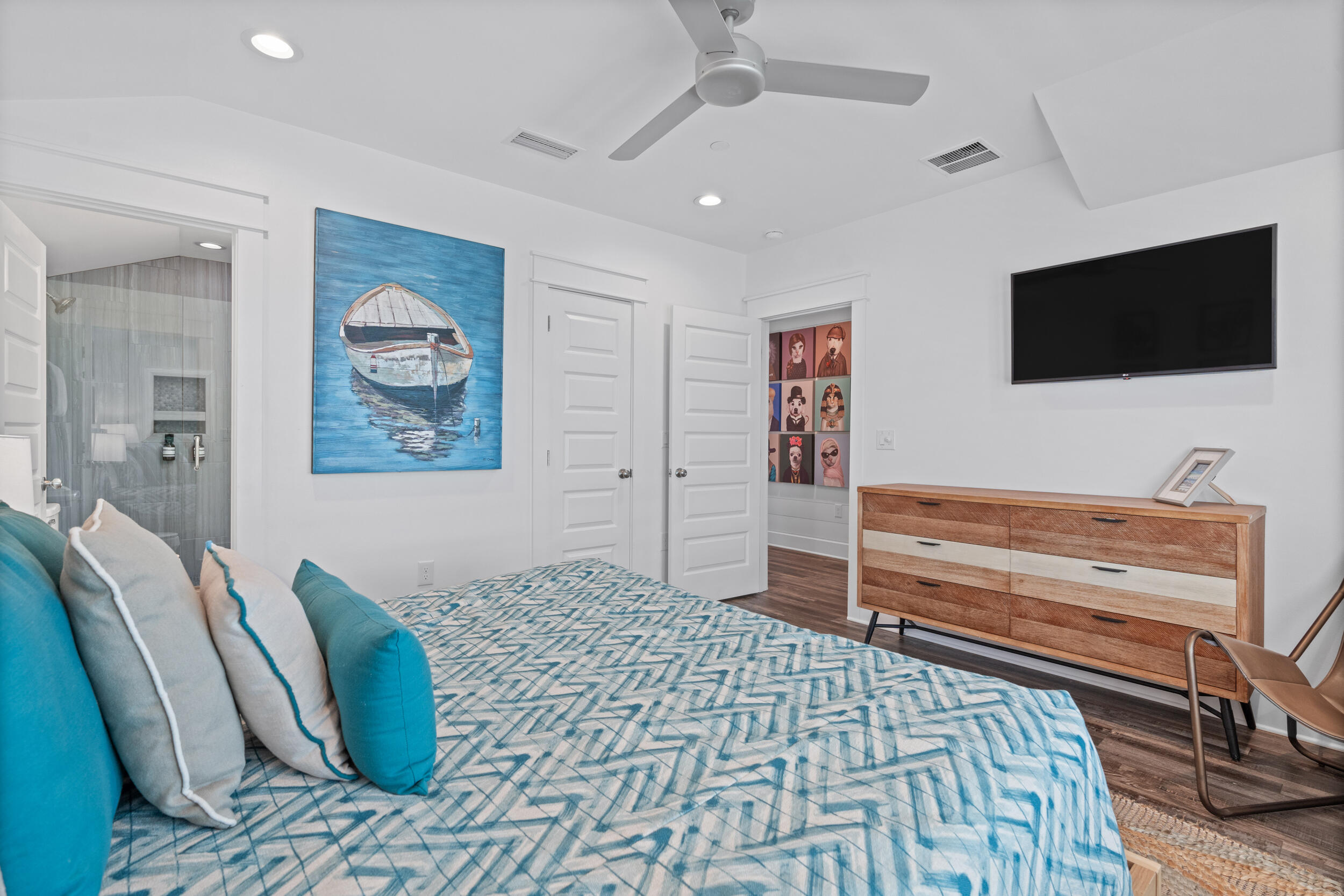 88 Pompano Street Destin, FL 32541 - Photo 84 of 109 a bedroom with a bed and a flat screen tv