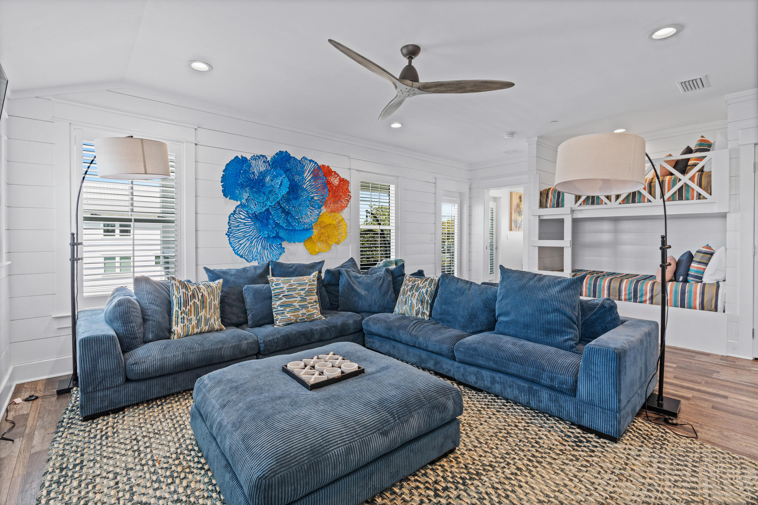 88 Pompano Street Destin, FL 32541 - Photo 91 of 109 a living room with furniture a rug and a window