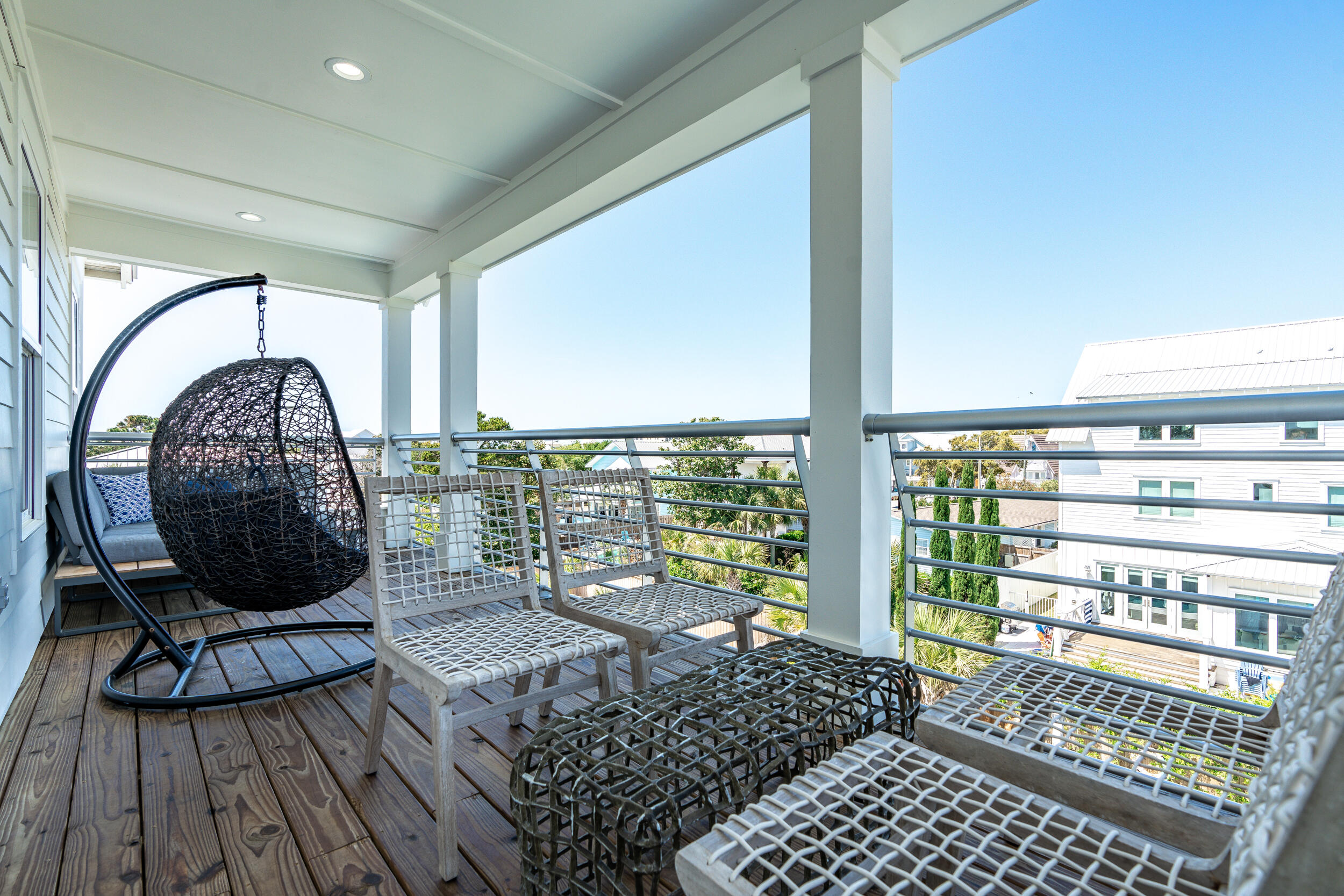 88 Pompano Street Destin, FL 32541 - Photo 97 of 109 a living room with a large window and a table