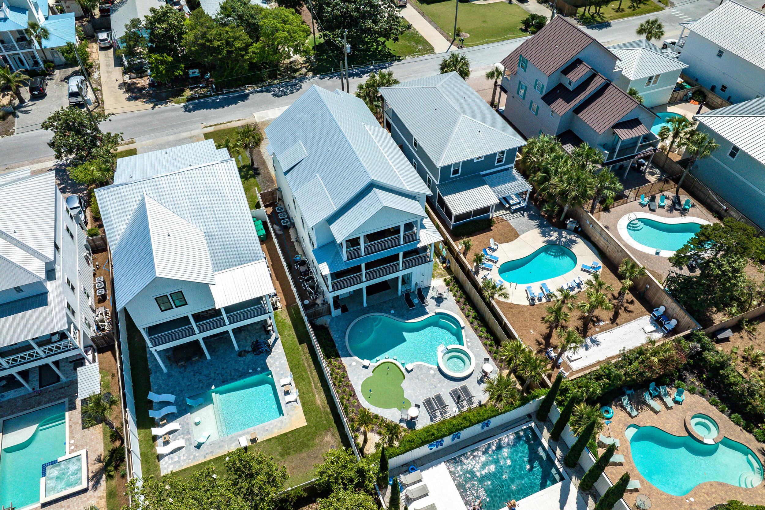 88 Pompano Street Destin, FL 32541 - Photo 99 of 109 an aerial view of a house with swimming pool and outdoor space