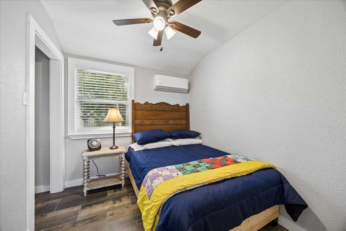 5130 Wonder Hill Road Chappell Hill, TX 77426 - Photo 24 of 31 a bedroom with a bed and a window
