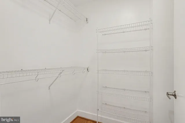 a view of a room with racks on the wall