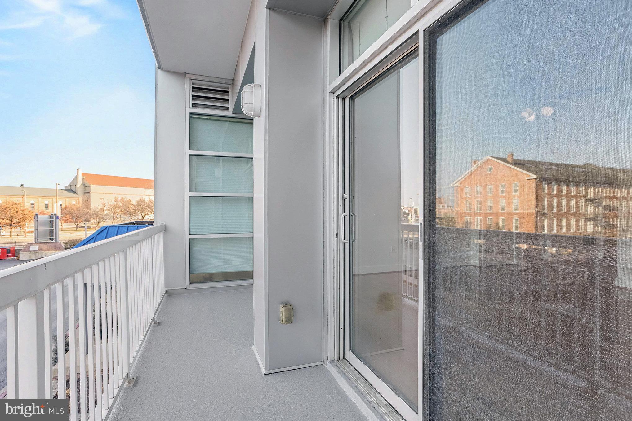2772 Lighthouse Point East, Unit 201 Baltimore, MD 21224 - Photo 34 of 36 a view of a walk in closet